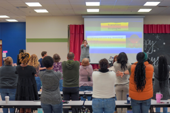 A MAGIC district partner helping lead an in-school training session.