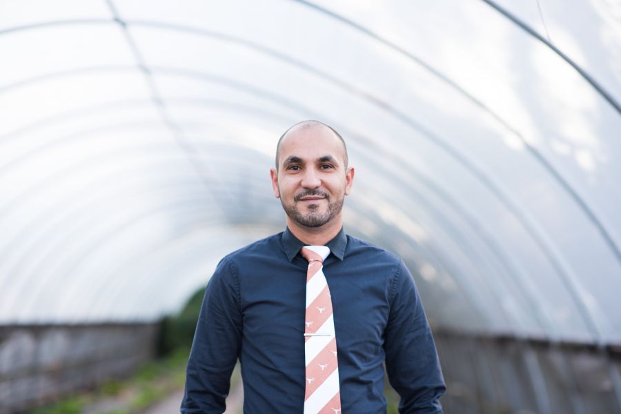 Augusto Cesar De Moraes in front of gray arena.