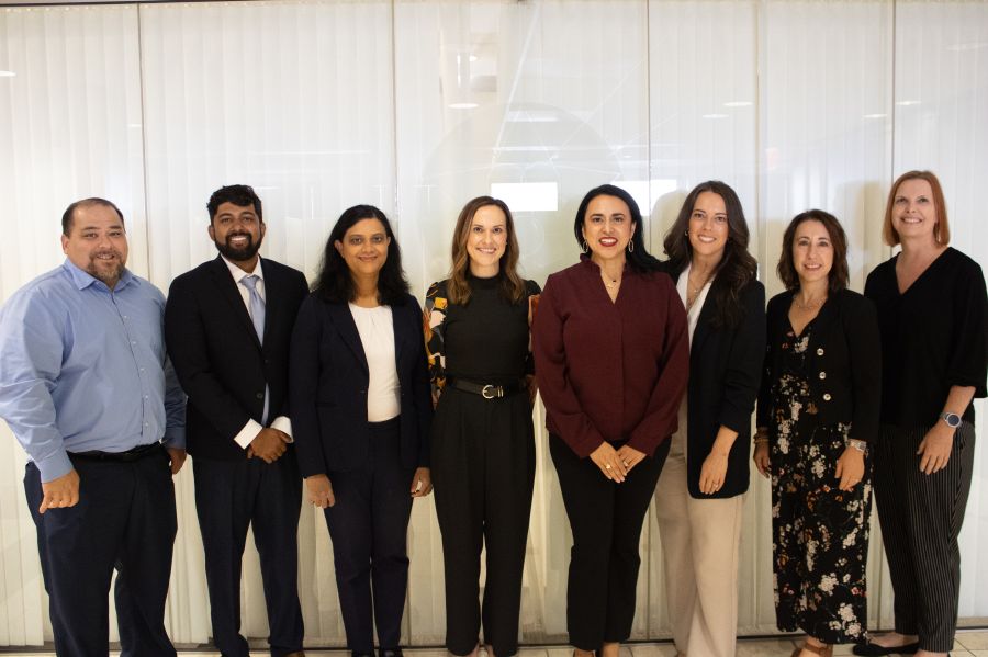 Executive Cohort teams gathered with Dr. Ginger Raya