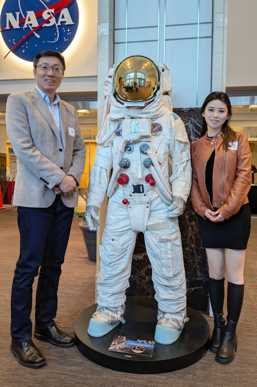 Hnag pictured at NASA along with mentor.